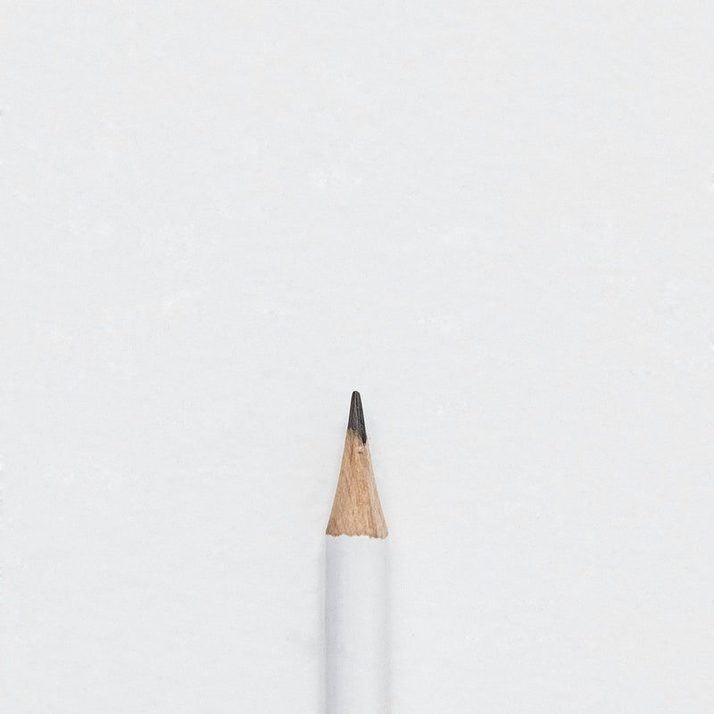 white lead pencil on surface