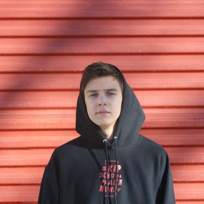 man wearing black and red pullover hoodie