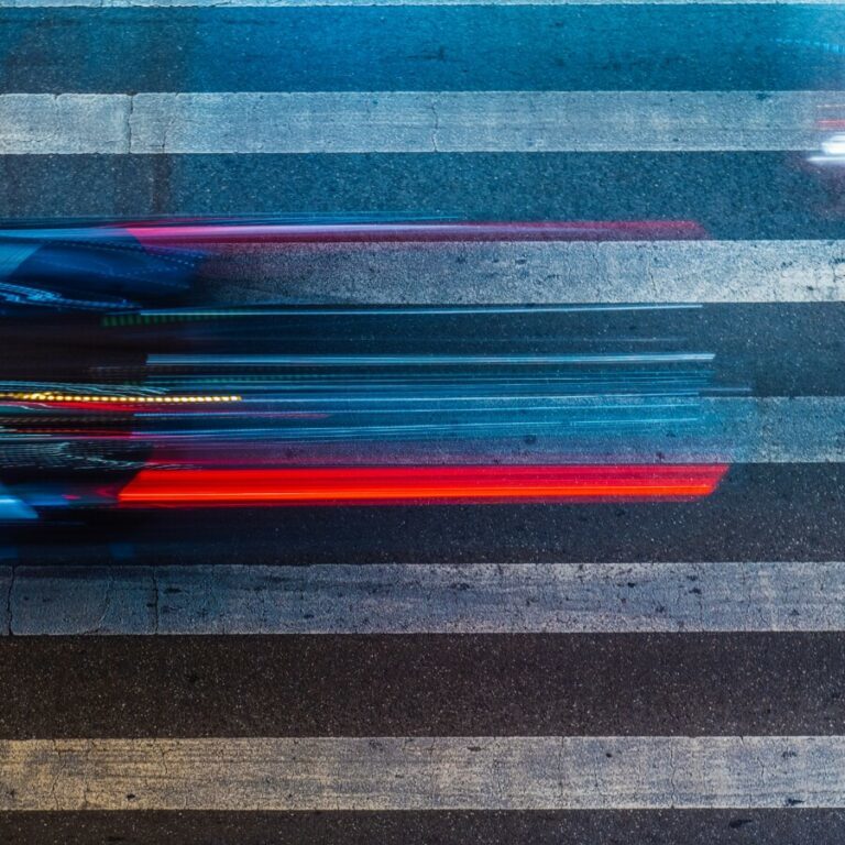 blue red and black striped textile