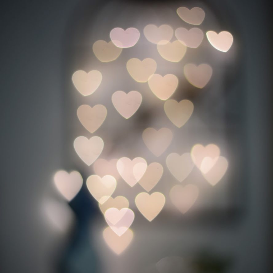 multiple blurry heart shaped lights